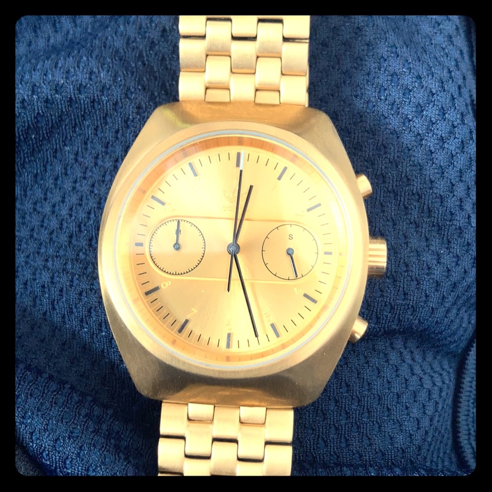 Gold addisas mens watch New